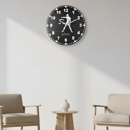 Slate clock face with Libra zodiac sign on a grid background