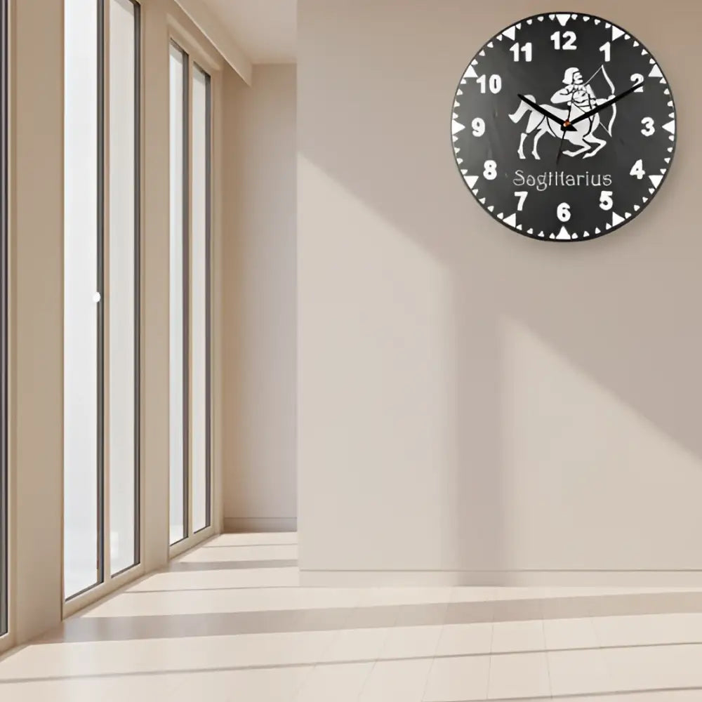 Sagittarius zodiac sign on a slate clock face with black background