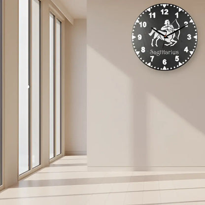 Sagittarius zodiac sign on a slate clock face with black background