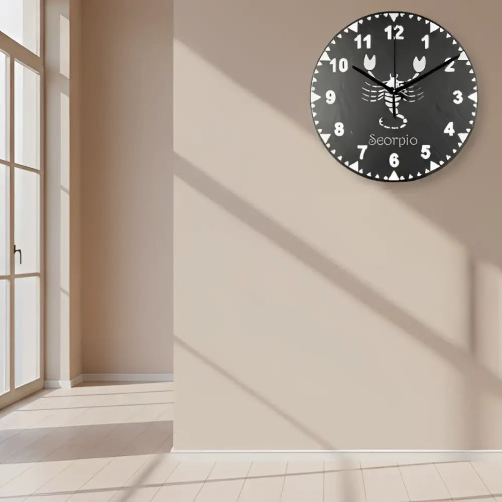 Slate clock face with Scorpio zodiac symbol and numbers on a black background