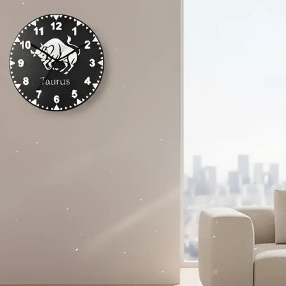 Slate clock face with Taurus zodiac sign on a black background