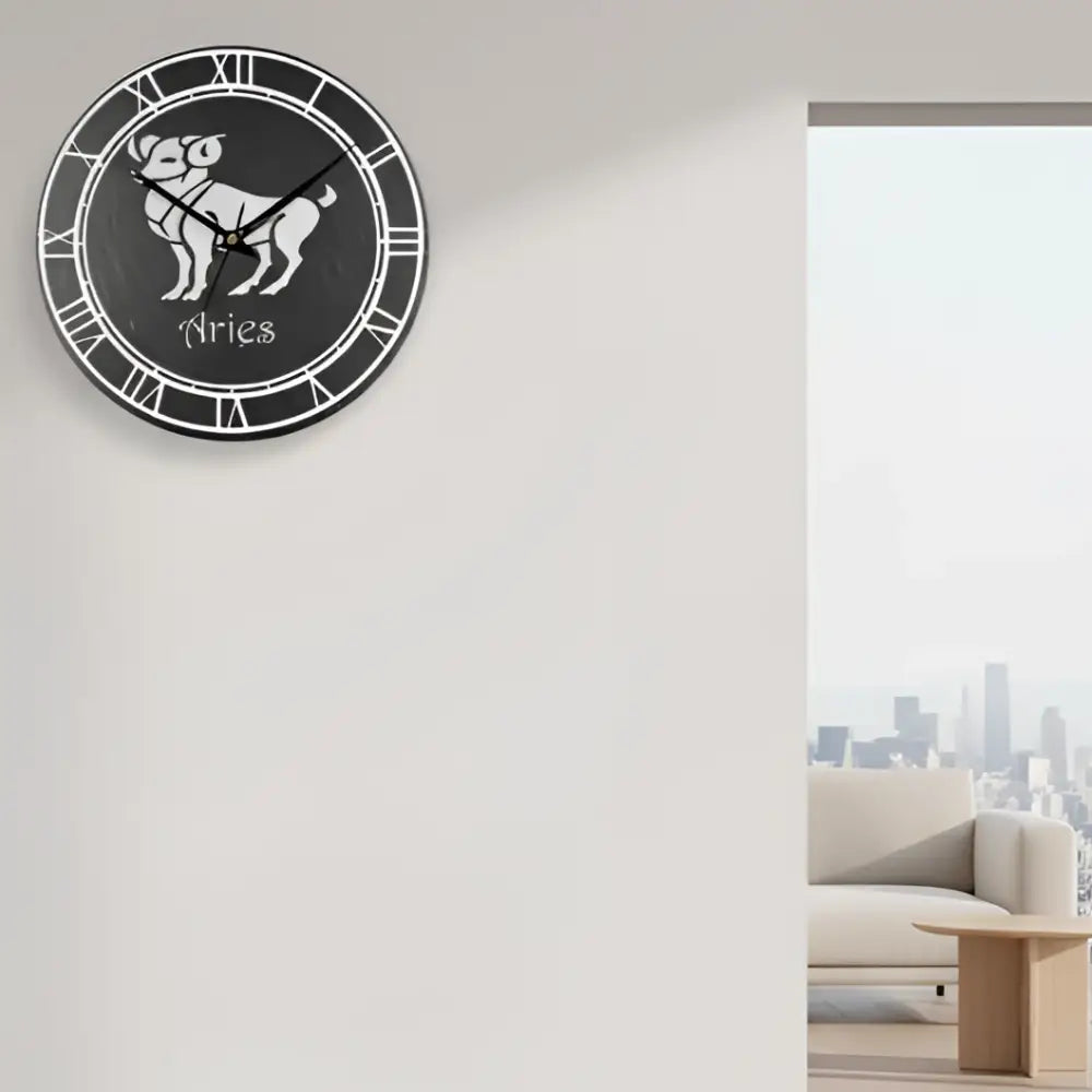 Aries zodiac sign in a circular design with Roman numeral border on a gray  slate background