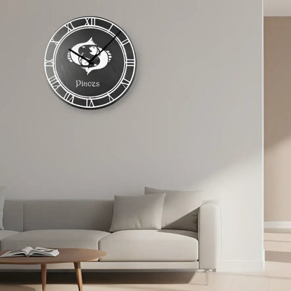 Pisces zodiac sign symbol on a circular slate board with Roman numeral border.