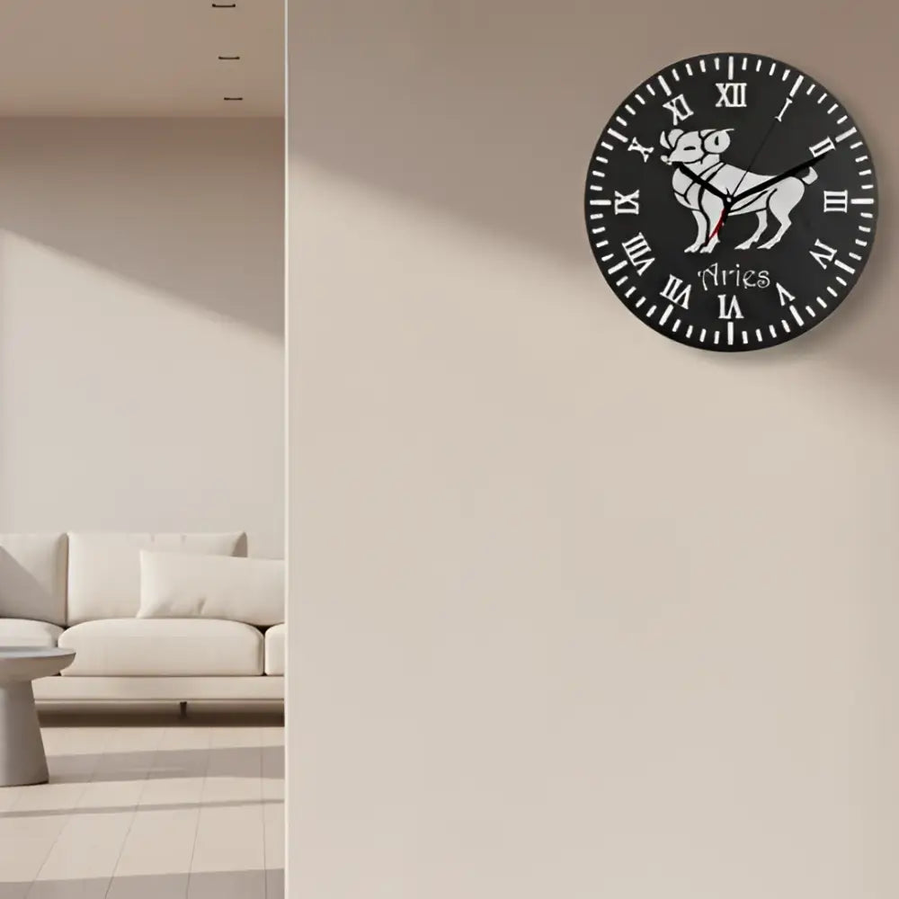 Circular design with Aries symbol and Roman numerals on a black slate background