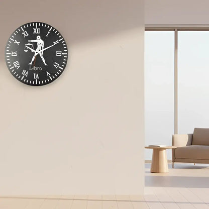 Decorative slate clock face with Libra zodiac sign and Roman numerals