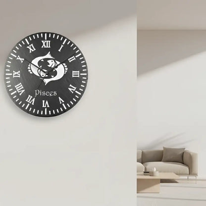Decorative slate wall clock with Pisces zodiac symbol and Roman numerals on a black background
