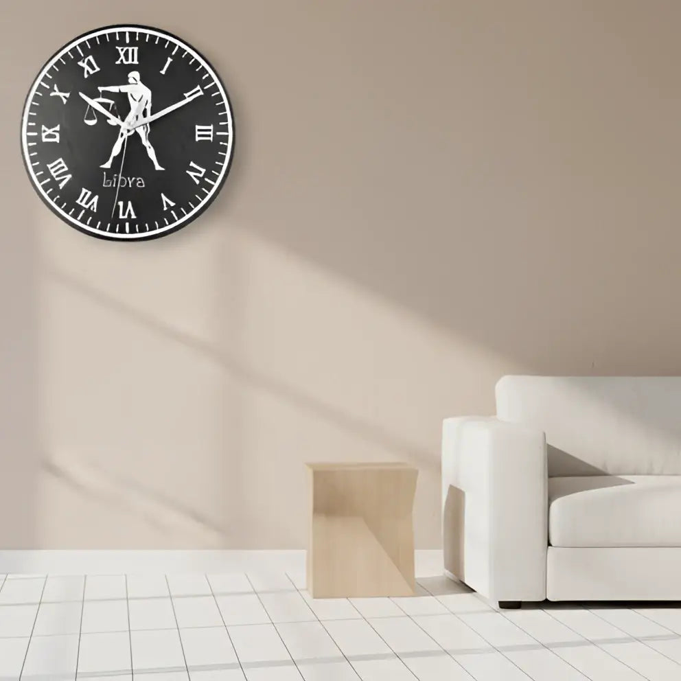 Decorative slate clock face with Libra zodiac symbol and Roman numerals