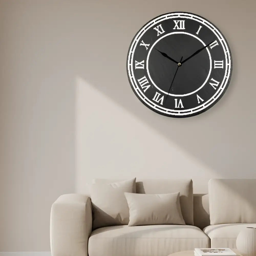 Circular clock face with Roman numerals on a slate background