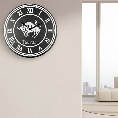 Taurus zodiac sign with Roman numerals on a circular slate background