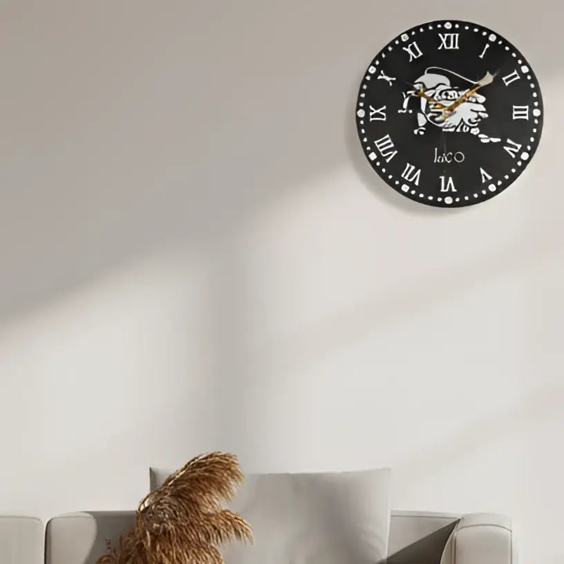 Circular design with a lion emblem and Roman numerals on a black slate background