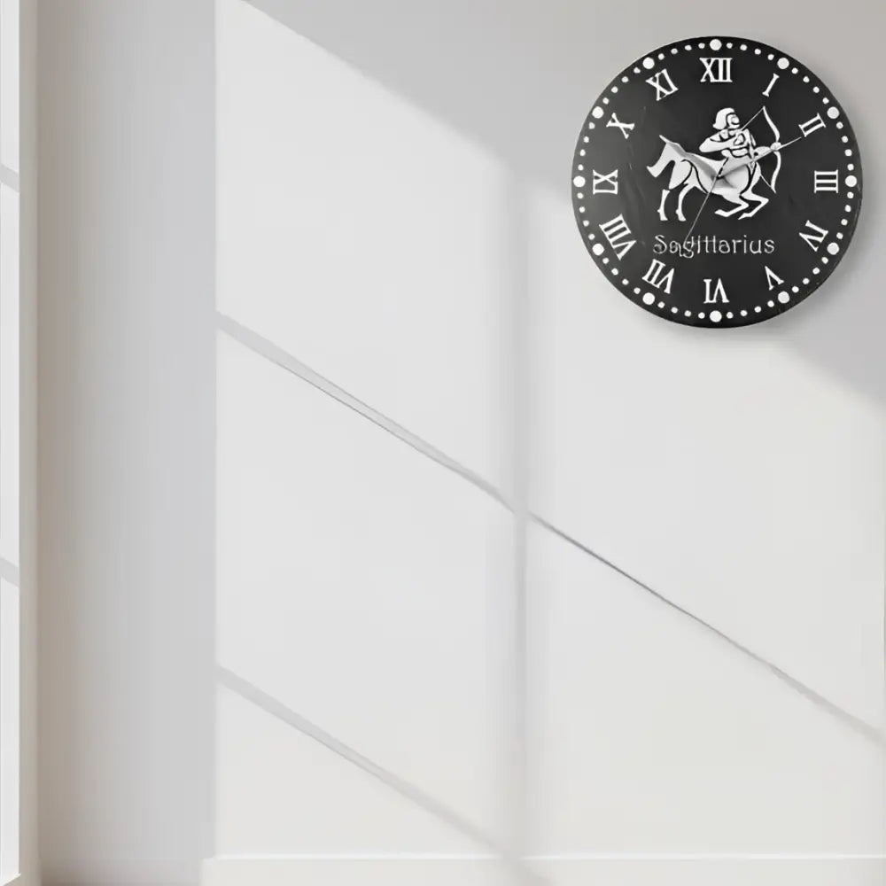 Sagittarius zodiac sign with Roman numerals on a circular slate background