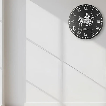 Sagittarius zodiac sign with Roman numerals on a circular slate background