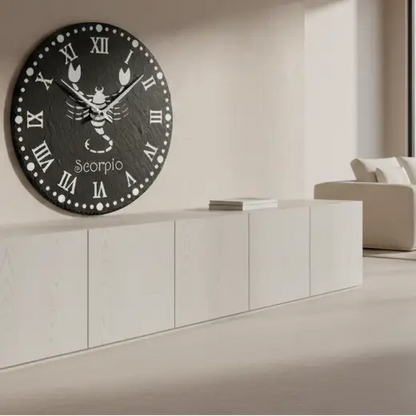 Decorative wall piece with Scorpio zodiac symbol and Roman numerals on a black slate background