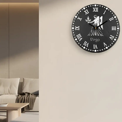 Decorative clock face with Virgo zodiac symbol and Roman numerals on a black slate background.