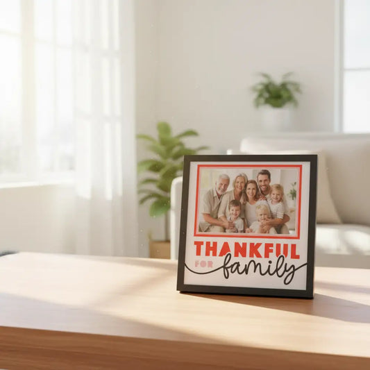 Framed print with 'Thankful for family' text on a white background