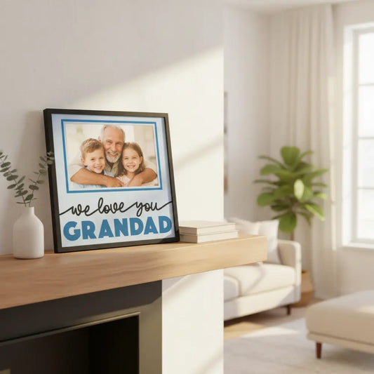 Framed picture with 'we love you GRANDAD' text on a light blue background