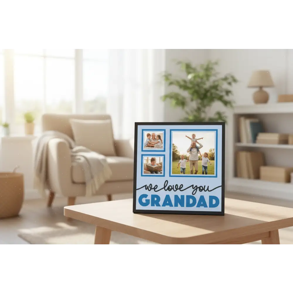 Decorative wall art with 'we love you GRANDAD' text on a light blue background