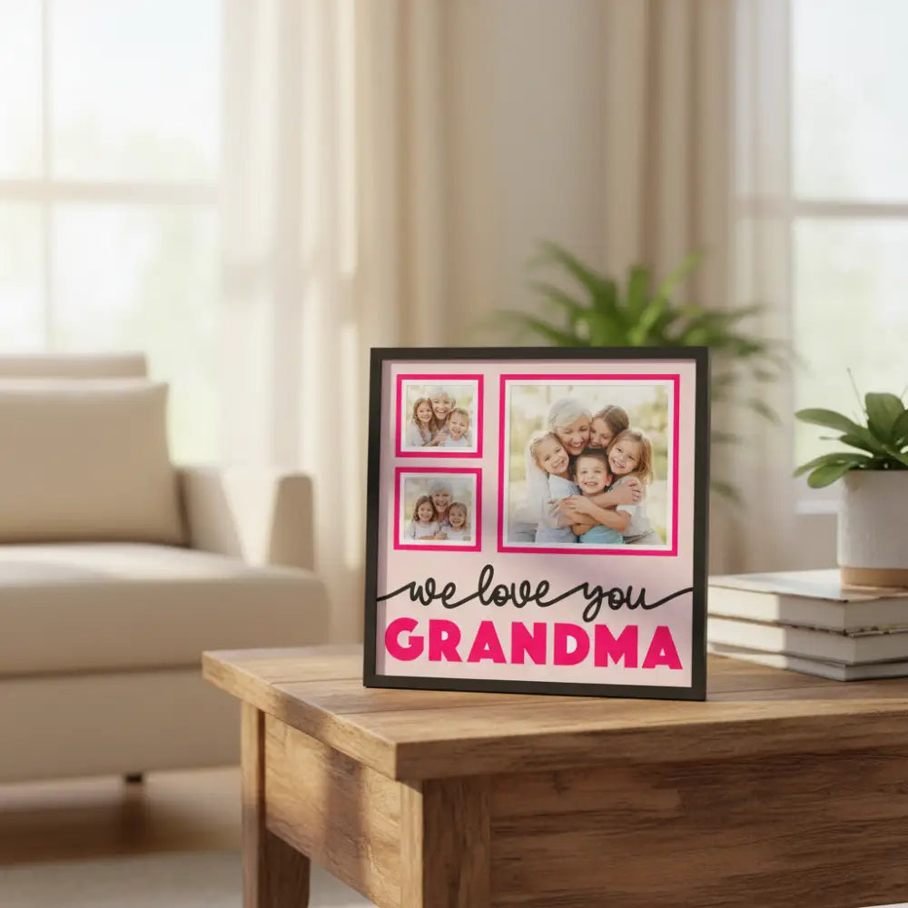 Decorative sign with 'we love you GRANDMA' text and pink frames on a light pink background