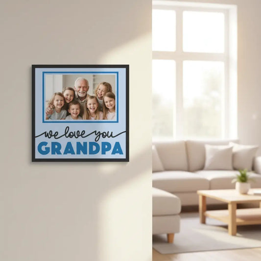 Framed picture with 'we love you GRANDPA' text on a light blue background