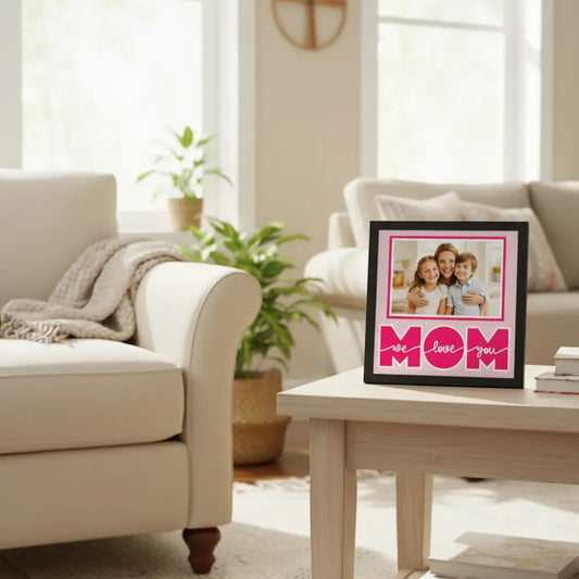 Pink 'We love you Mom' text on a light pink background