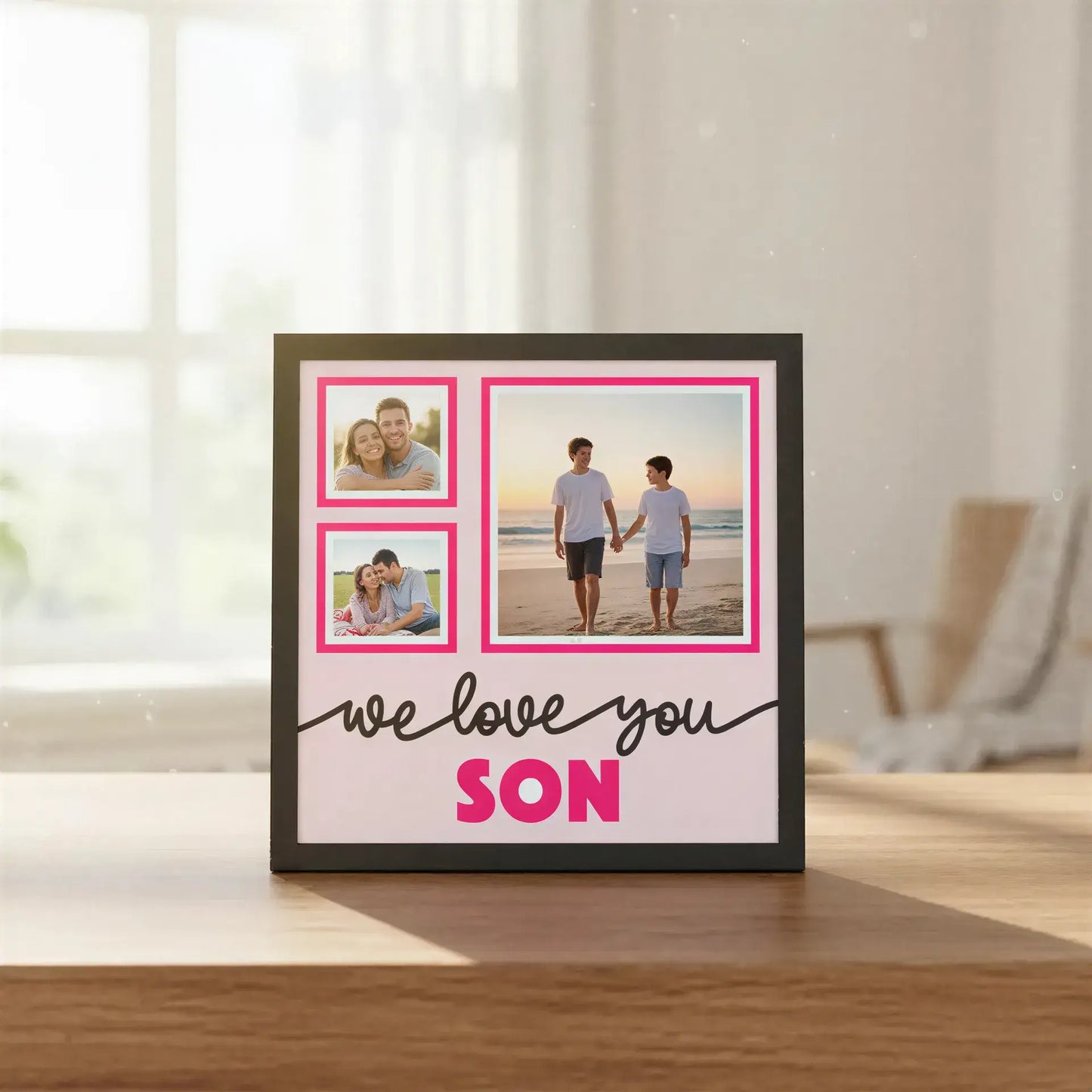 Framed artwork with 'we love you son' text and pink and gray design elements.