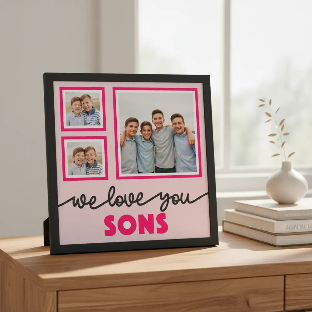 Decorative wall art with 'we love you SONS' text and pink frames on a light pink background.