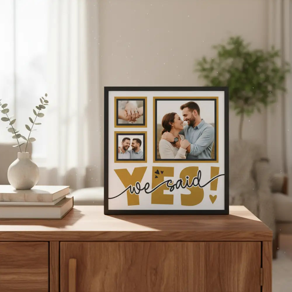 Decorative wall art with 'YES! we said' text and gold frames on a white background