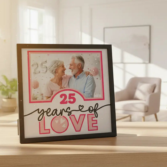 Decorative sign with '25 years of love' text on a white background