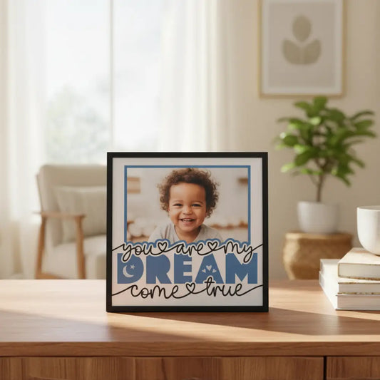 Decorative text 'you are my dream come true' with heart symbols on a light blue background.