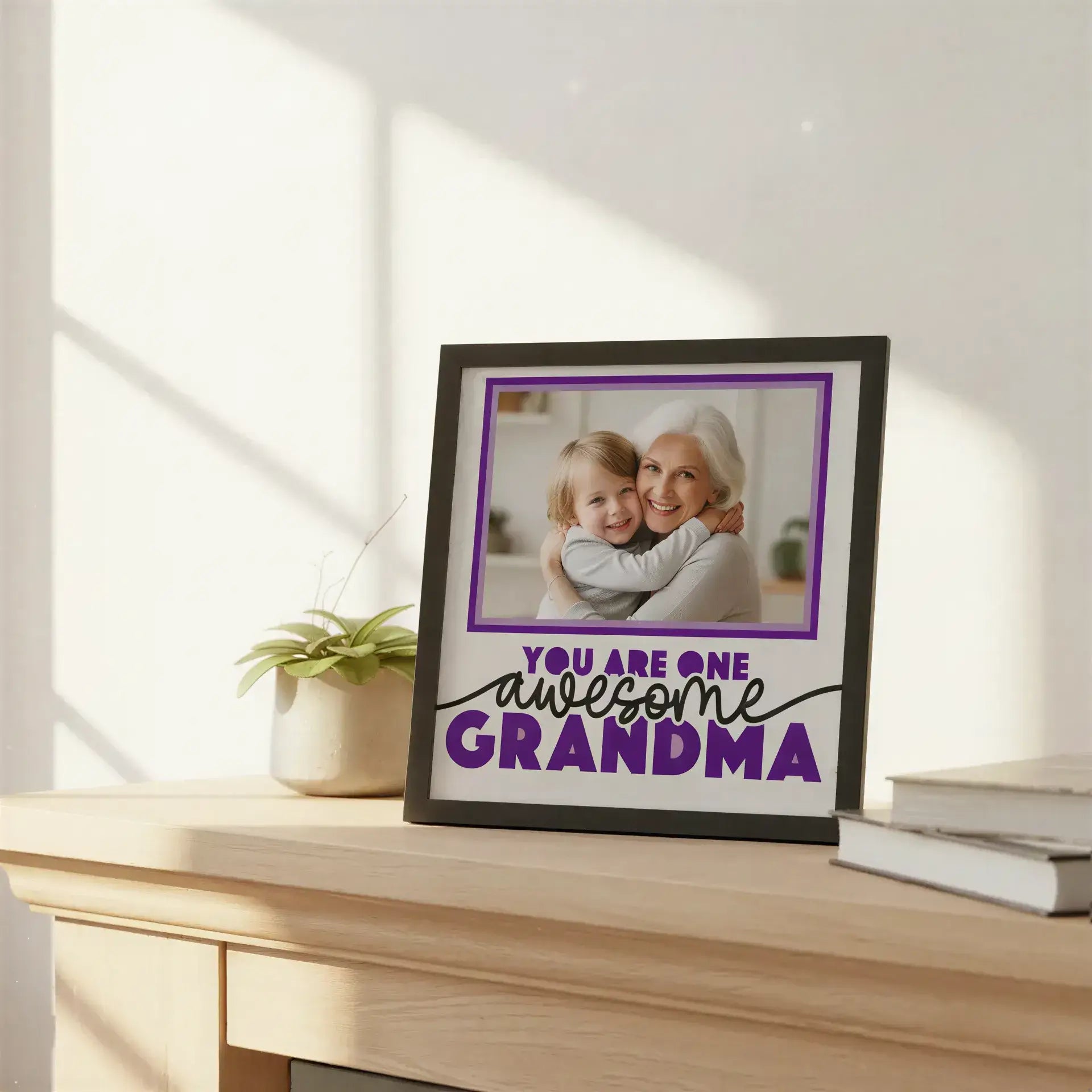 Framed picture with 'You are one awesome grandma' text on a white background