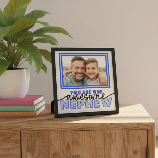 Decorative sign with text 'You are one awesome nephew' on a blue background