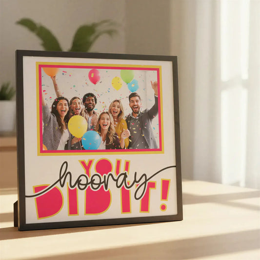 Decorative sign with 'hooray' and 'yay!' text on a white background